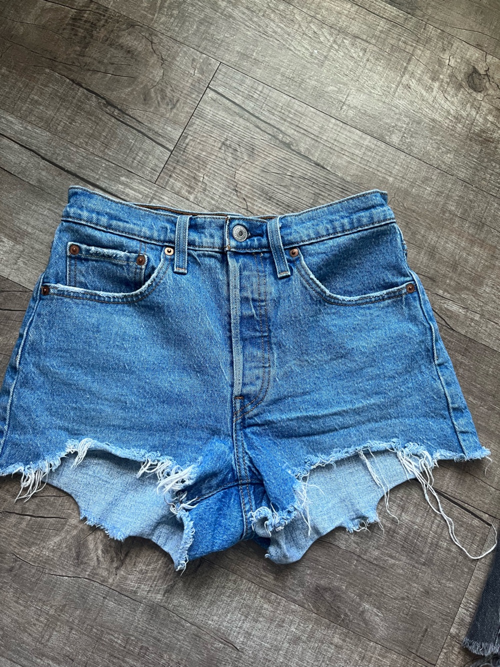 Levi's Medium Blue Distressed Cutoff Denim Shorts